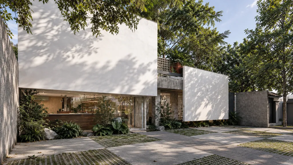 Kafekota, Bandung: the frontage with a planted court and two floating white volumes