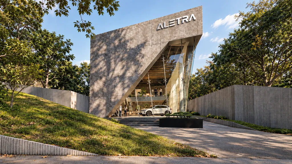 Aletra Kemang, Jakarta: the faceted stone showroom above a green slope