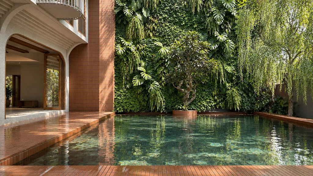 IH Villa: a courtyard pool against a planted wall
